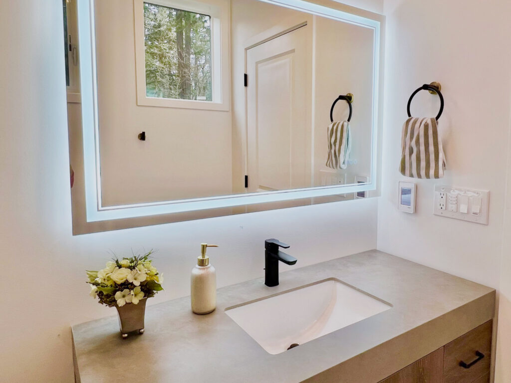 Lake Oswego Bath Remodel with back and front lit vanity mirror