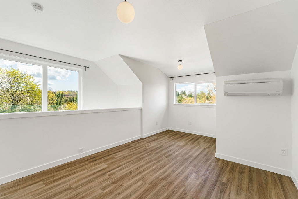 SW Portland Remodeler shows upstairs living area with LVP Flooring