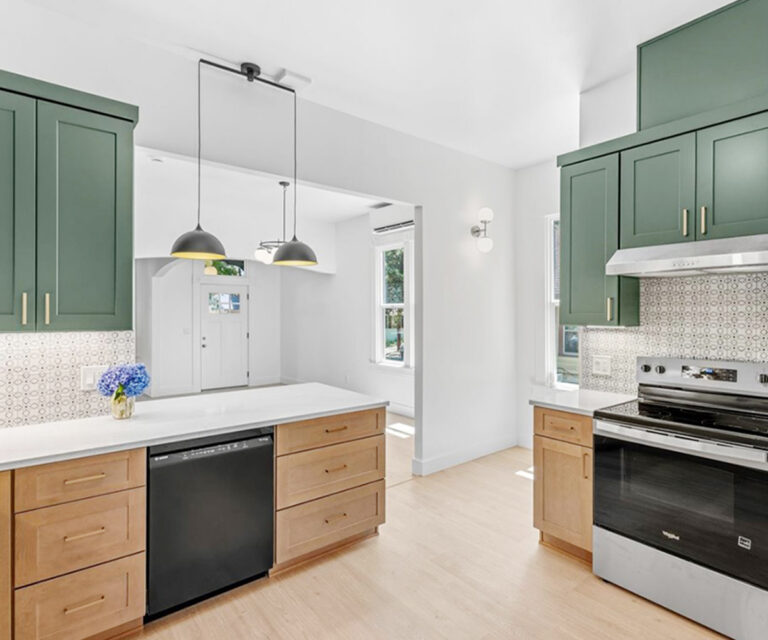 NE Portland remodeled kitchen with green upper and natural lower cabinets, retro tile backsplash, new appliances, sink and faucet